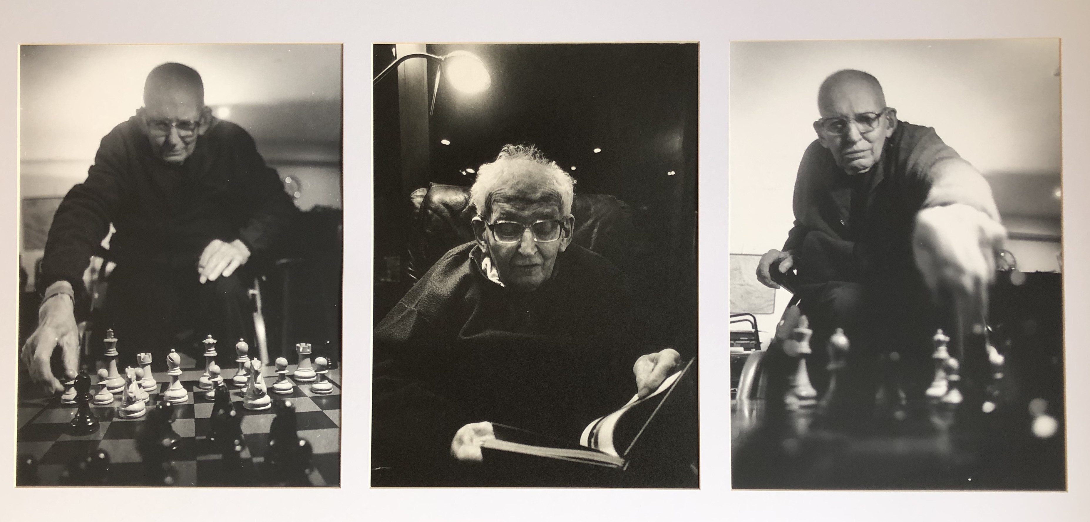 A triptych showing my father at age 93. The left and right images are of him playing chess. The centre panel shows him reading under a strong light.